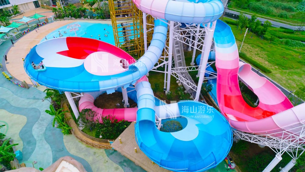 双重风暴，极致竞速——星际盘旋+巨浪翻滚组合引爆水乐园刺激体验